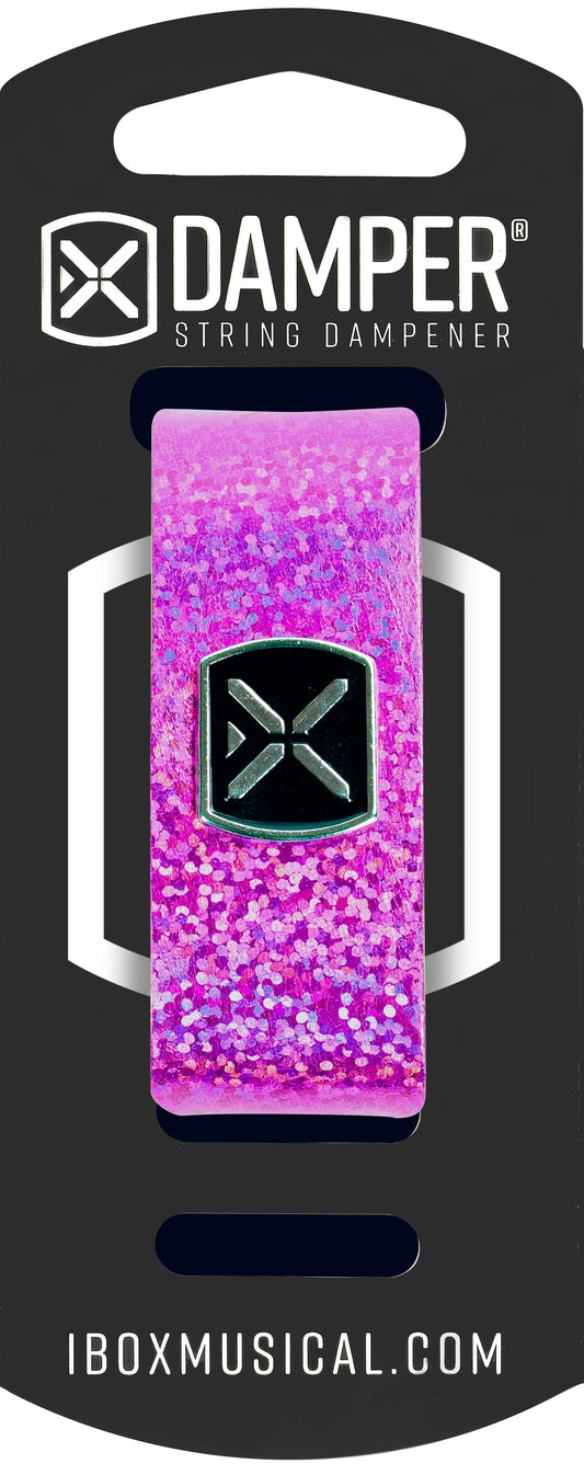 SORDINA MEDIANA - MD - PARA GUITARRA ELECTRICA, GUITARRA ACOUSTICA Y BAJOS DE HASTA 5 CUERDAS. COLOR ROSA HOLOGRÁFICO