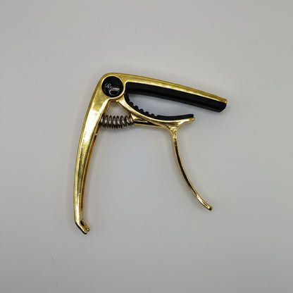 CAPO PARA GUITARRA COLOR ORO